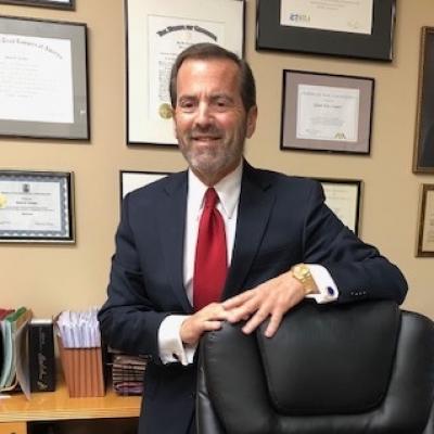 Glenn E. Cooper