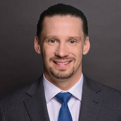 Adam J. Schleis